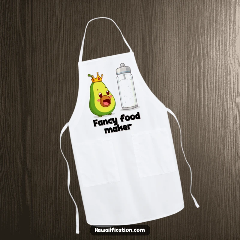 Funny apron showing a crowned avocado character with a comically shocked expression facing a giant salt shaker, ready for delicious, funny meals.