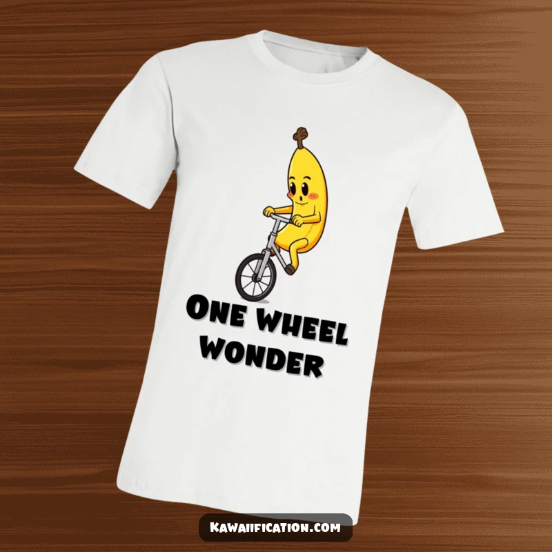 Funny t-shirt with a determined banana character precariously balancing on a unicycle, offering a chuckle-worthy visual.